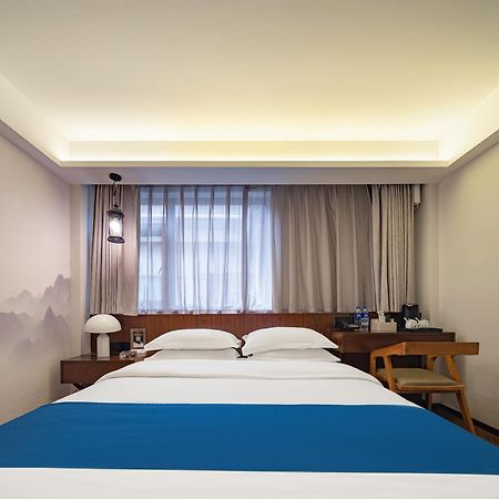 Hotel 張家界武陵源北岸輕奢客棧 森林公園店 Zhangjiajie Exterior foto
